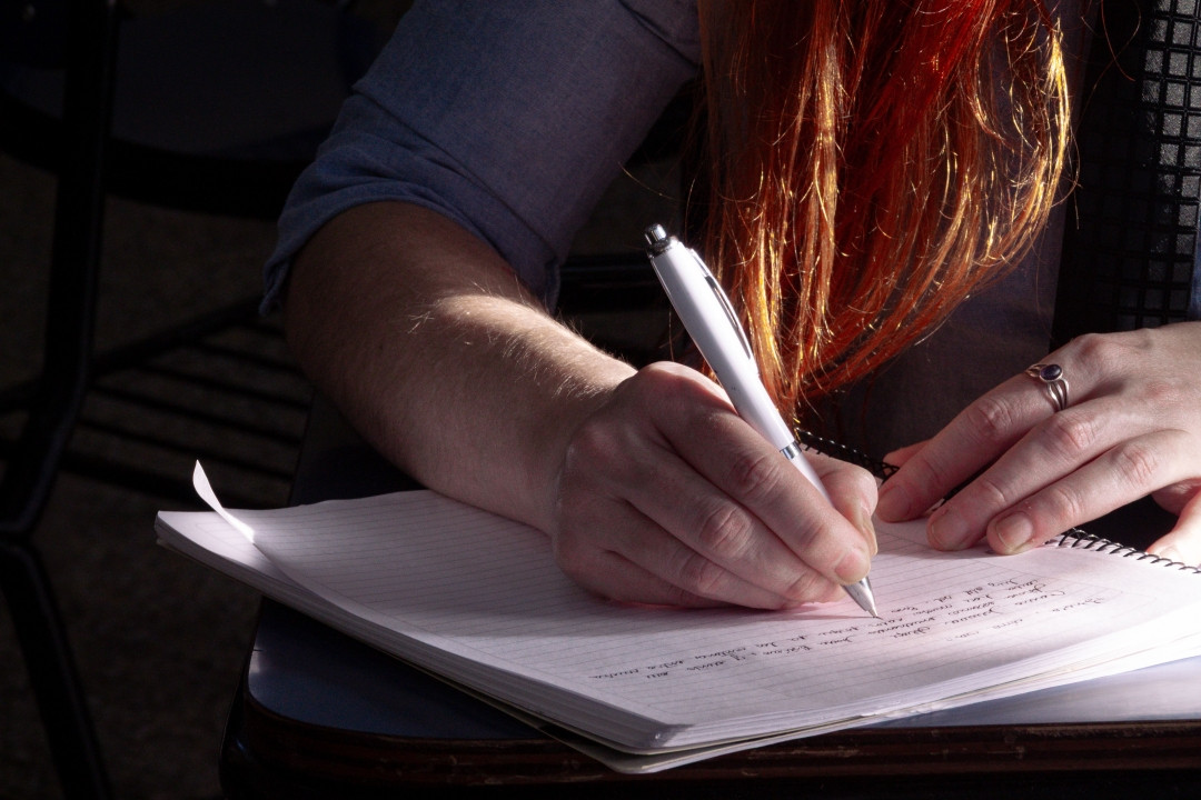 Photo by jessica olivella: https://www.pexels.com/photo/close-up-of-writing-hands-in-classroom-setting-37825335/